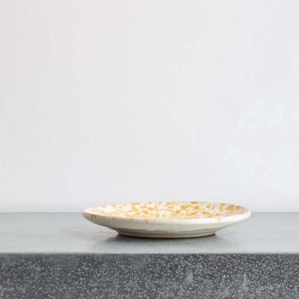 244 FASANO Assiette en faïence tachetée - Ambre
