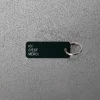 Women Various Keytags Merci x - Porte-clé "Ici C'est Merci" - Vert